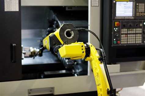 automation of cnc machines|robots for cnc machines.